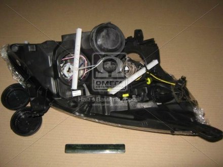 Фото 1 - фара лев. OP VECTRA C 06- TYC 20-B042-A5-2B Фара лев. OP VECTRA C 06- TYC 20-B042-A5-2B (фото 1)